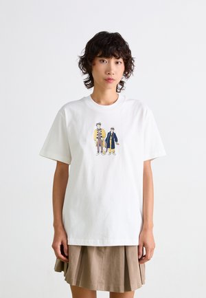 White cotton t-shirt featuring a colorful illustration of two figures on the front, short sleeves, and a crew neck design.