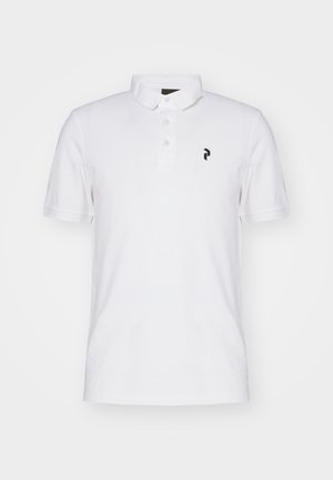 Bijela polo majica s klasičnom kragnom, tri gumba na prednjoj strani i malim crnim logotipom na lijevoj strani prsa. Pamuk, kratki rukavi.