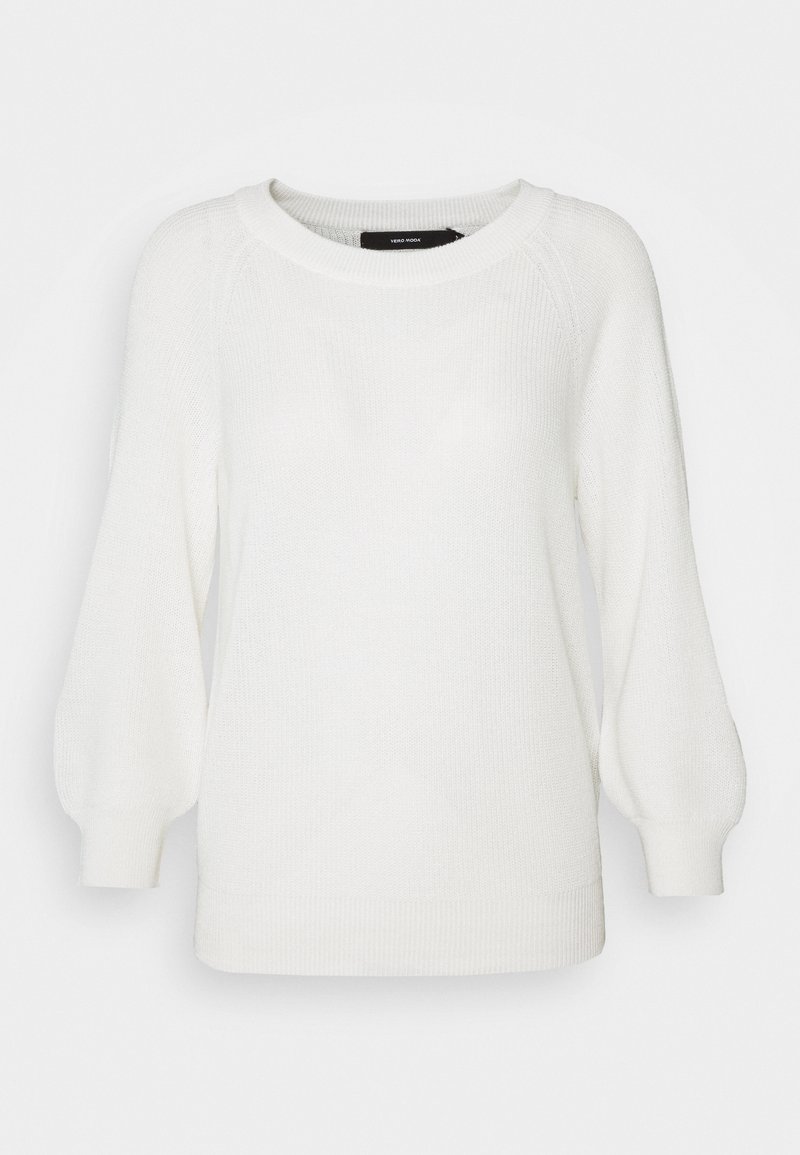 Valkoinen neulottu pusero, jossa on pyöreä kaula-aukko ja puffihihat. Varustettu ribbikaarroke- ja helmaresorilla, joka tuo tekstuuria viimeistelyyn.