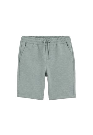Pantaloncini in maglia grigio chiaro con cintura elastica e coulisse, dotati di tasche frontali laterali e vestibilità comoda.