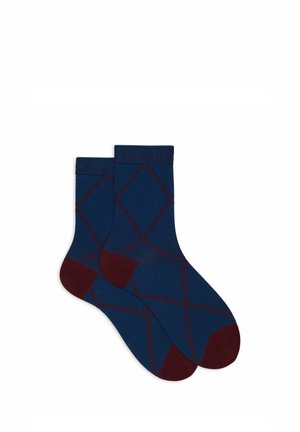 Navy blue socks with a diamond pattern outlined in maroon. Knit texture with a solid maroon toe and heel. Ribbed cuff at the top.