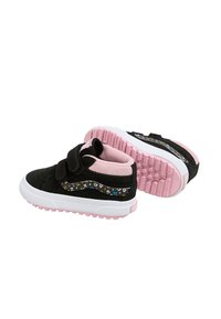 Black suede sneakers with pink accents, featuring a floral pattern on the side, Velcro straps, and a white rubber sole with pink traction.