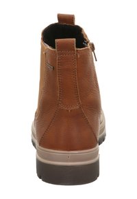 Bottine en cuir marron avec une finition texturée, fermeture éclair latérale et semelle en caoutchouc beige contrastée. Dotée d'une languette à l'arrière.