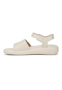 Light beige sandals with a smooth leather upper, open toe design, adjustable ankle strap, and a cushioned platform sole.
