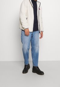 Tommy Jeans Plus Kurtka z polaru