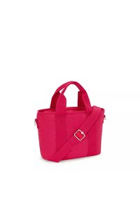 Lille pink Tote-bag lavet af stof, med dobbelte top håndtag og en justerbar skulderrem med detalje i metal spænde.
