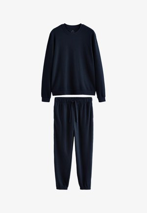 Tengerészkék hosszú ujjú felső és hozzáillő, húzózsinóros, elasztikus derékpántos nadrág, mindkettő texturált kötött anyagból készült.