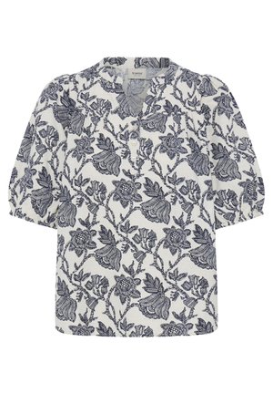 Hvid bluse med sort blomsterprint, korte pufærmer og en V-hals med tre knapper foran.