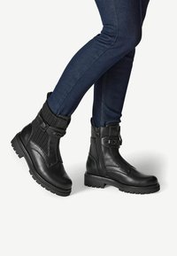 Marco Tozzi Platform ankle boots - black comb