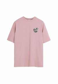 Pink cotton T-shirt with short sleeves, featuring a black and white graphic design on the left chest area. Soft, smooth texture.
