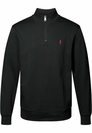 Must have pehmeast kangast must pooltõmblukk, millel on soonikuline tekstuur, pikad varrukad ja väike punane logo rinnal.