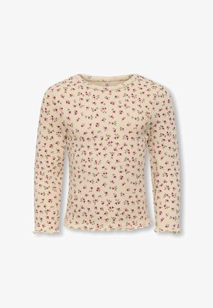 Langärmliges Creme-Oberteil mit geripptem Design, das ein florales Muster in Pink und Grün zeigt. Der Saum hat eine Rüschenkante für zusätzliche Details.