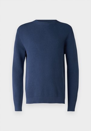 Mornarsko modra pletena pulover z okroglim izrezom, dolgimi rokavi, rebrastimi manšetami in robom. Tkanina ima teksturiran vzorec.