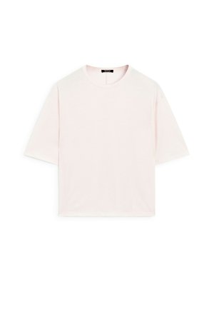 Short-sleeve, crew-neck t-shirt in soft light pink fabric. Loose fit with straight hem and no visible patterns or embellishments.