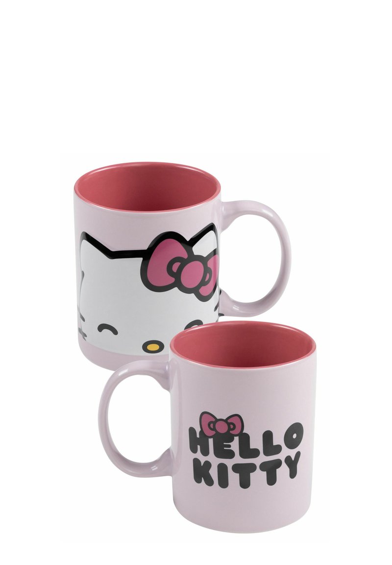 Tazza in ceramica rosa con il volto bianco di Hello Kitty da un lato e il testo "HELLO KITTY" dall'altro, con un interno e un manico rosa.