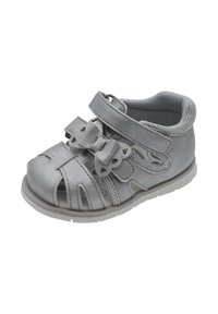 Sandale en cuir argent avec design découpé et accent nœud. Dotée de sangles réglables en velcro et d'une semelle en caoutchouc pour plus de confort et d'adhérence.