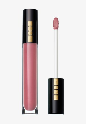 Liquid lipstick in a clear tube with a black cap, featuring gold accents. The fluid is a soft pink with slight shimmer and a flocked applicator.