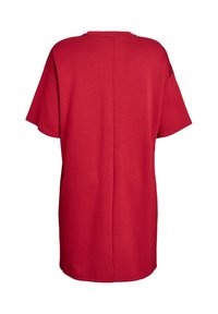 Červené bavlnené oversized tričko s krátkymi rukávmi, okrúhlym výstrihom a detailom švu na chrbte, s hladkou textúrou a bez viditeľných vzorov.