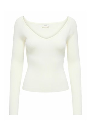 Világos bézs, bordázott, hosszú ujjú felső mély V-kivágással és testhez simuló szabással.