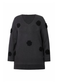 Pull en tricot gris avec un col en V, des manches longues et des appliqués de fleurs noires à l'avant. Motif texturé et détails à côtes au niveau de l'ourlet.