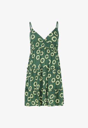 Grøn spaghetti strop kjole med et tieret design, der har et cirkulært mønster i gult. Letvægtsstof med en afslappet pasform.