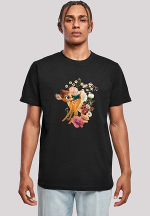 Black short-sleeve t-shirt featuring a colorful graphic of a deer surrounded by various flowers. Cotton material with a relaxed fit.