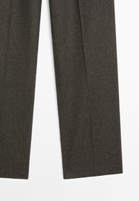 Dark gray tailored trousers made of fine wool blend fabric. Features straight legs, subtle texture, and pressed creases along the front.
