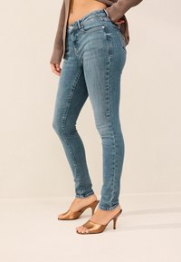 Next TALL - Liibuvad teksad - smoky blue