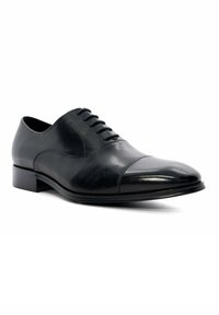 Black leather dress shoe with a smooth finish, rounded toe, and six eyelet lace-up design. Features a low heel and subtle stitching accents.