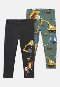 Μαύρο κολάν με σχέδια που απεικονίζουν κατασκευαστικά οχήματα σε πράσινο φόντο. Κατασκευασμένο από απαλό ύφασμα, με ελαστική μέση για άνεση.