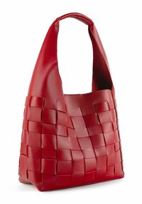 Red woven leather bag with a slouchy silhouette, curved handle, and a textured pattern of interlaced panels.
