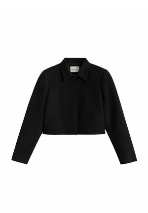 Melna īsa jaka ar gariem piedurknēm, asu apkakli un vienu pogu augšpusē.