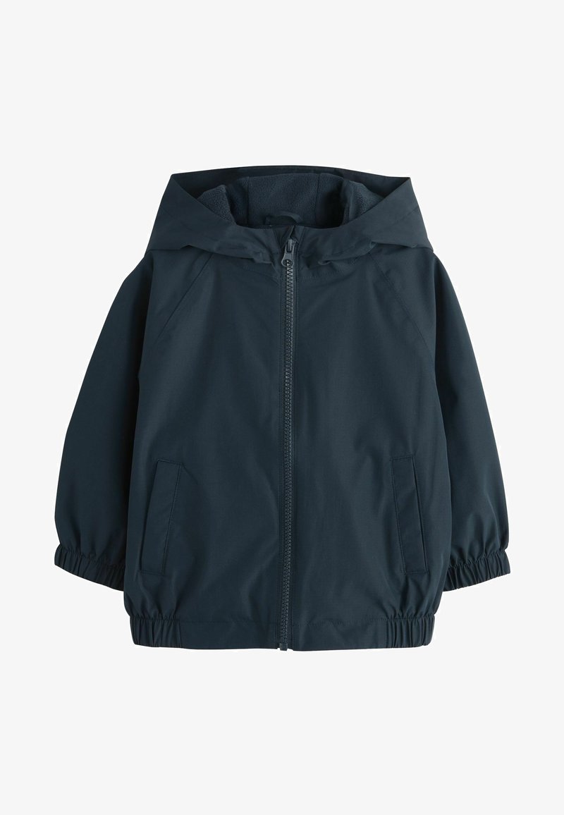 Tumesinine tõmblukuga jakk, millel on kapuuts, elastsed varrukad ja küljetaskud. Valmistatud kergest, veekindlast materjalist, millel on sile pind.