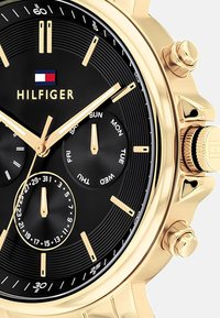 Tommy Hilfiger Hodinky se stopkami - gold coloured black