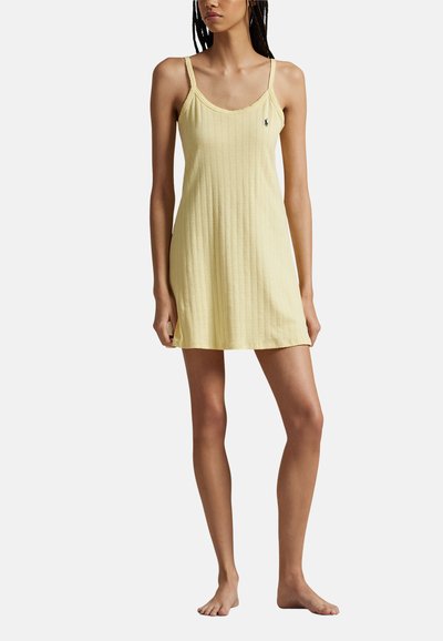 Yellow ribbed camisole dress with thin straps and a rounded neckline, featuring a small branded logo on the left chest area.