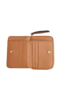 Tan leather wallet open, featuring multiple card slots, a zippered compartment, and a smooth texture with metallic accents.