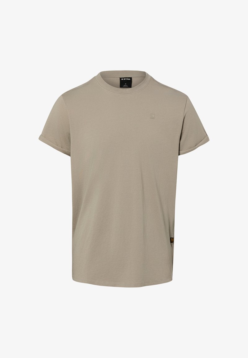 Camiseta beige de manga corta de algodón con cuello redondo, pequeño logo bordado en el pecho y puños de las mangas doblados.