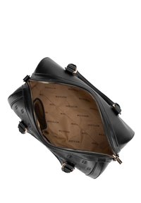 Black leather handbag with gold hardware, zip closure, and an embossed pattern. The interior is tan, featuring the "WITTCHEN" logo.