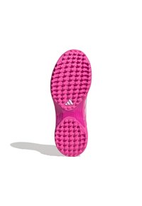 Suola di scarpa sportiva rosa con un motivo testurizzato a pois. Presenta il marchio "TORSION SYSTEM". Il materiale appare sintetico e flessibile.