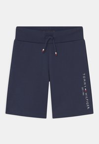 Donkerblauwe shorts van katoen, met een geribde elastische tailleband met trekkoord en witte logo-tekst op het linkerpootje.