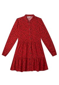 Robe boutonnée rouge à manches longues, avec un motif floral noir et une jupe évasée ornée d'un bord à volants.
