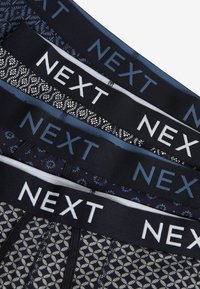 Next 4 PACK - Trunks - dark blue geo pattern