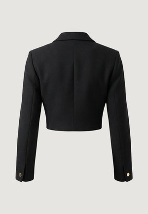 Blazer nero corto con maniche lunghe, piccoli bottoni dorati sui polsini e un colletto semplice, mostrato da dietro su uno sfondo neutro.