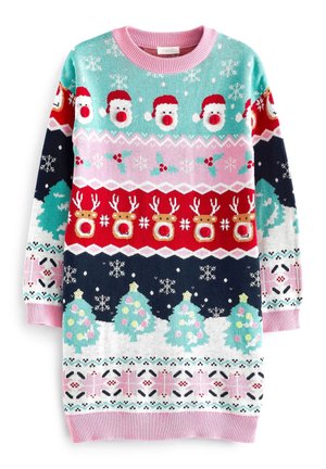 Enfant portant un pull de Noël coloré avec des visages du Père Noël, des rennes, des flocons de neige, du houx et des arbres décorés en rouge, rose, bleu et vert.
