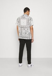 Replay Chinos - black