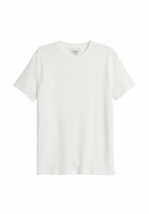 Witte t-shirt met korte mouwen van een gestructureerde stof, met een ronde halslijn en een rechte snit; voorzien van een subtiel wafelpatroon over het hele shirt.