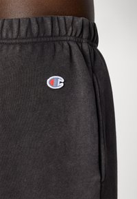 Champion ICONS CUFF PANTS - Tréningruha alsók - black