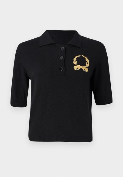 Black short-sleeve polo shirt made of soft fabric, featuring a collar, three buttons, and a gold laurel wreath emblem on the left chest.