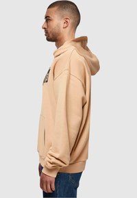 Merchcode Hoodie - unionbeige