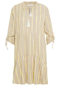 Robe rayée en beige, jaune et gris avec un col à volants, des liens et des manches courtes. Dotée d'un bas évasé et d'un tissu texturé.